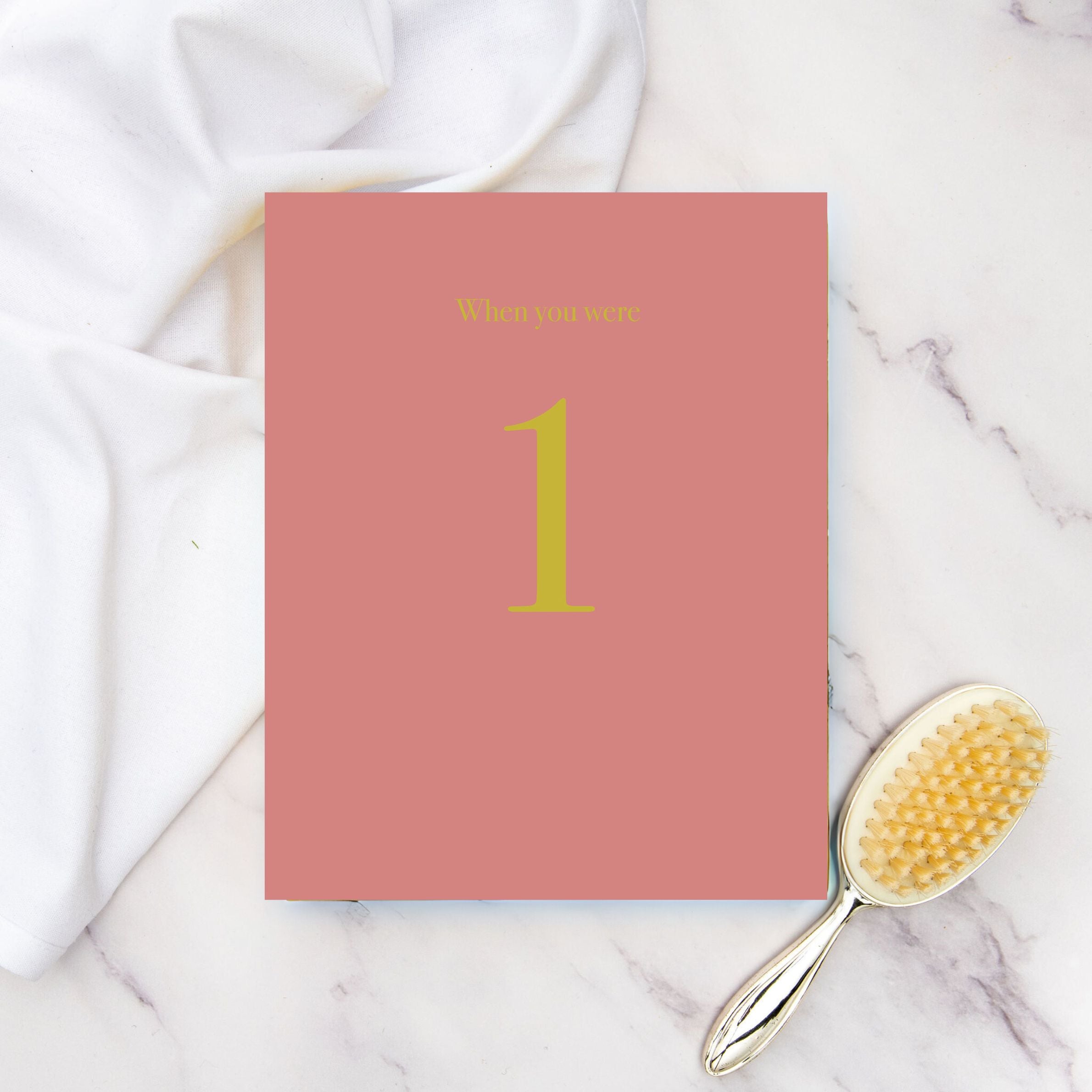 when you were 1 | a record book in pink