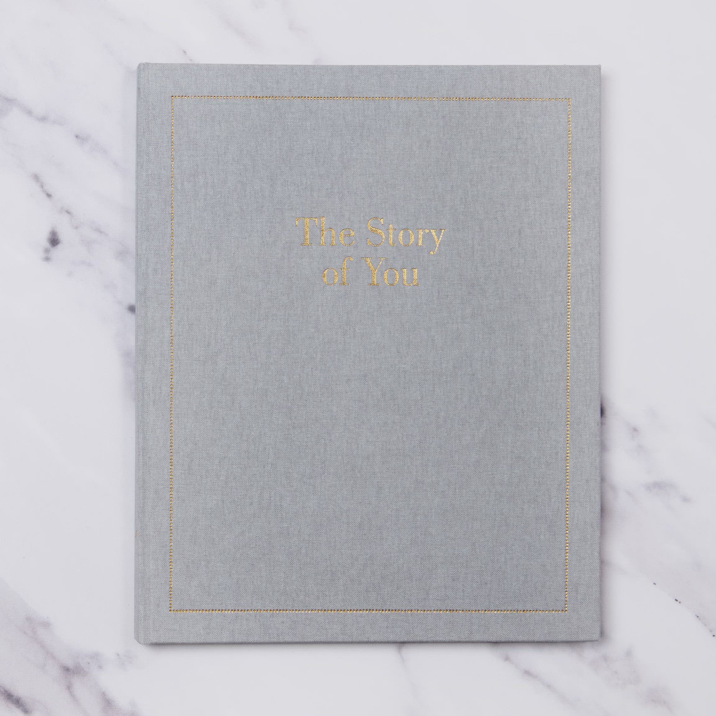 the story of you, a baby memory book in grey