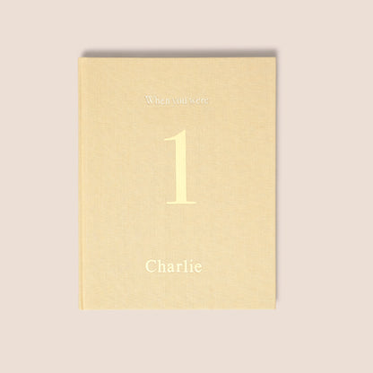 when you were 1 | a record book in sand